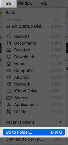 Accessing Finder's Go to Folder option from the menu bar on a Mac.